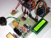 Arduino workplace alcohol detector with reporting through SMS