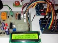 Arduino workplace alcohol detector with reporting through SMS